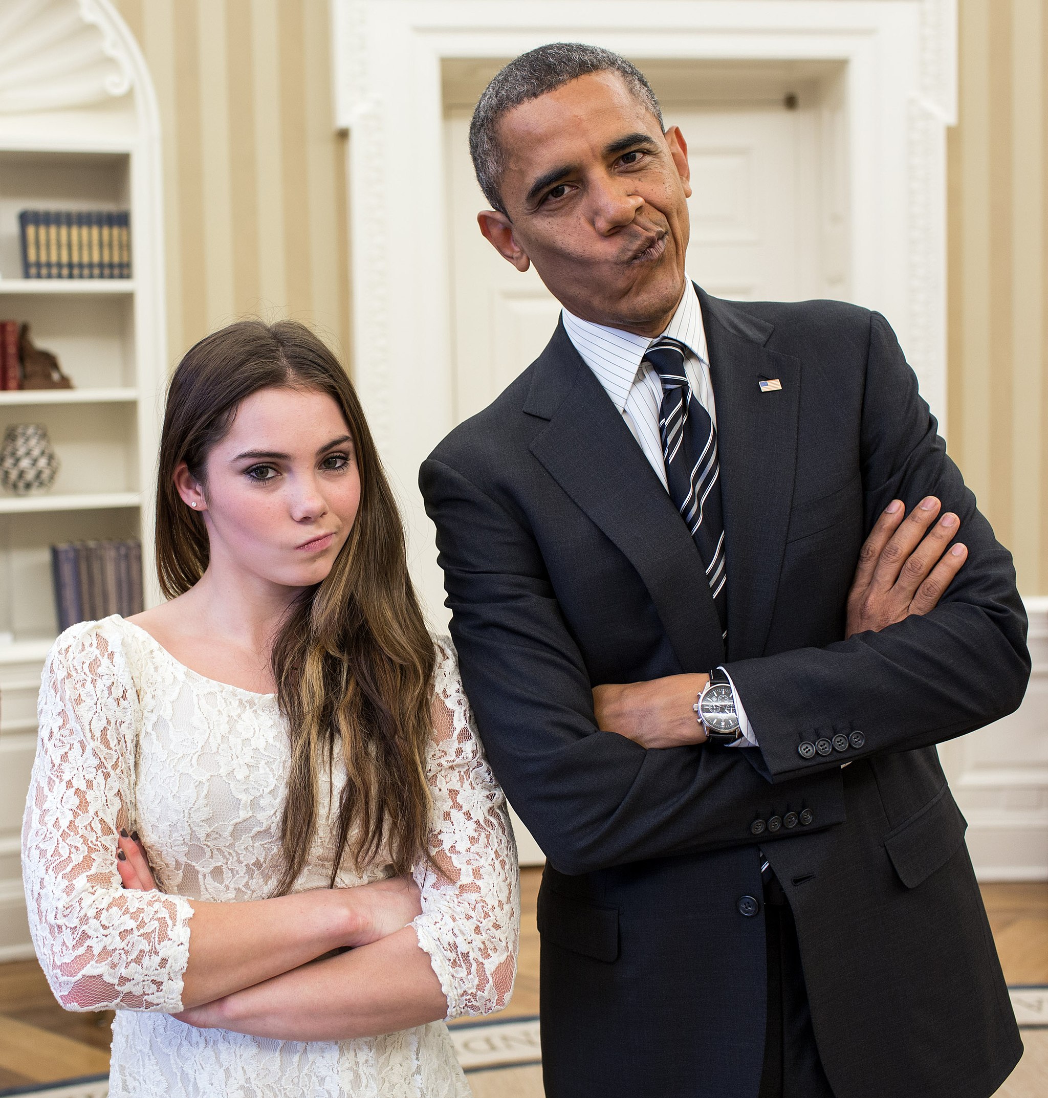 posed photo of intentionally smirking Barack Obama and USA gymnast McKayla Maroney illustrates visual drama and interest