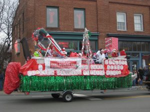 Figure (a) shows a float made by Girl Scouts